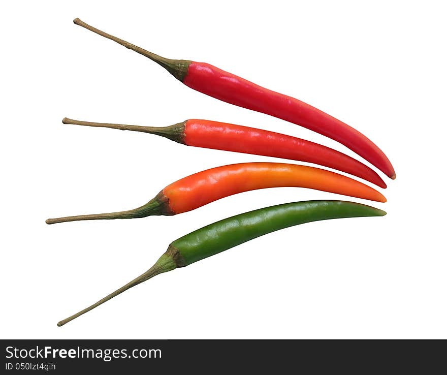 Green, orange & red chillies isolated on white