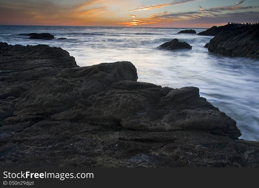 Exposure of a coastal tide surging through a cove. Exposure of a coastal tide surging through a cove.