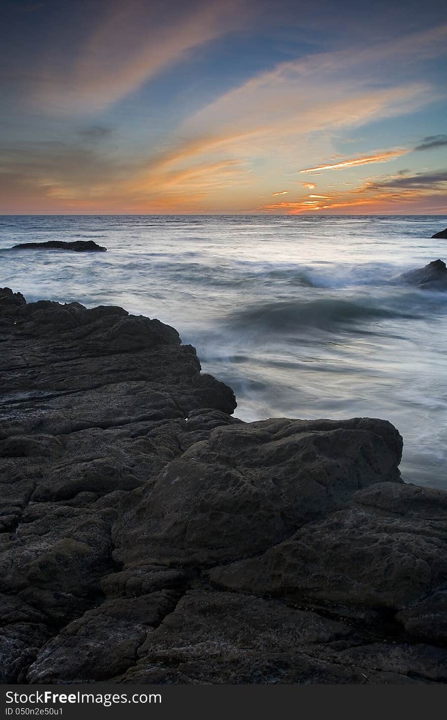 Exposure of a coastal tide surging through a cove. Exposure of a coastal tide surging through a cove.