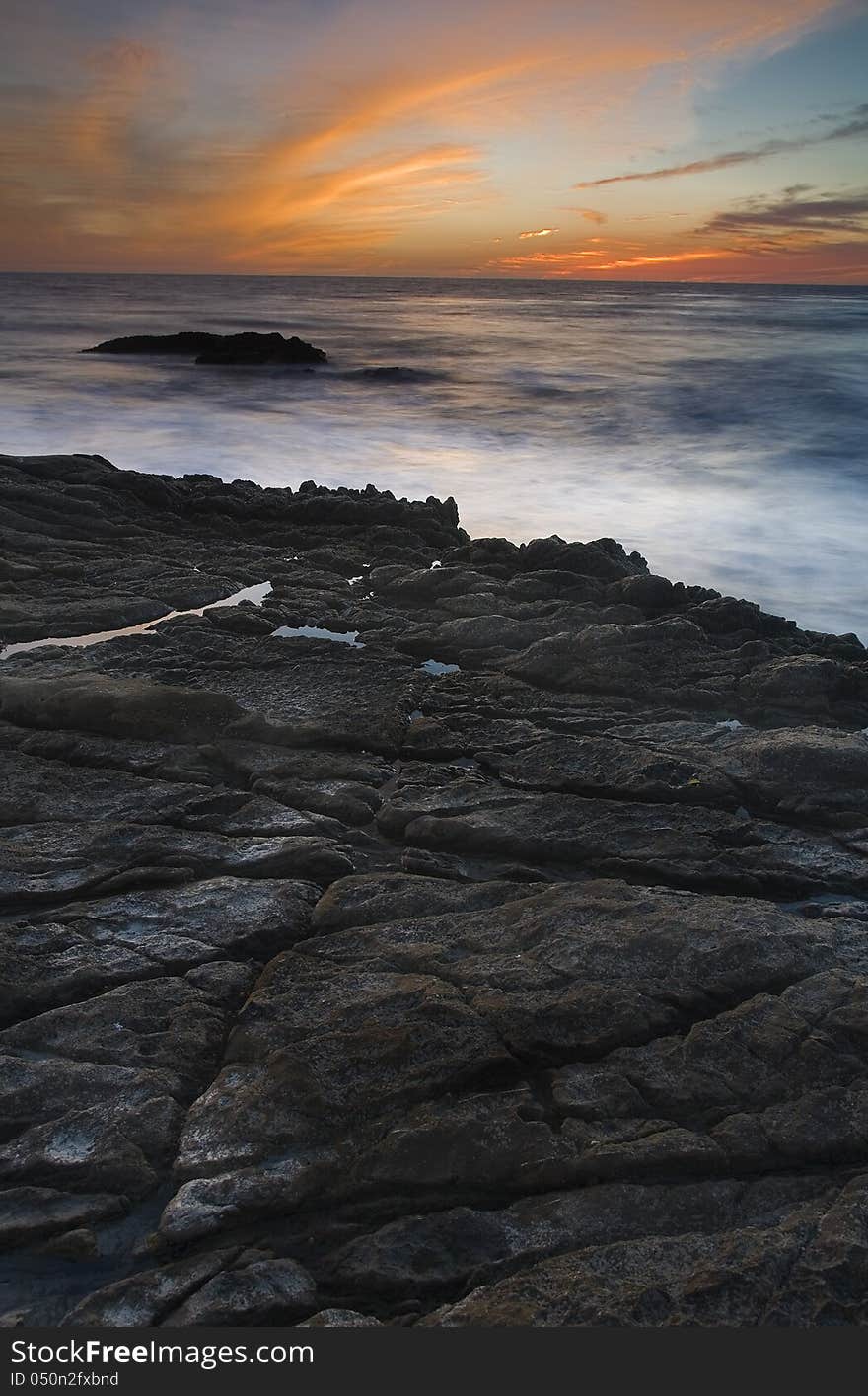 Exposure of a coastal tide surging through a cove. Exposure of a coastal tide surging through a cove.