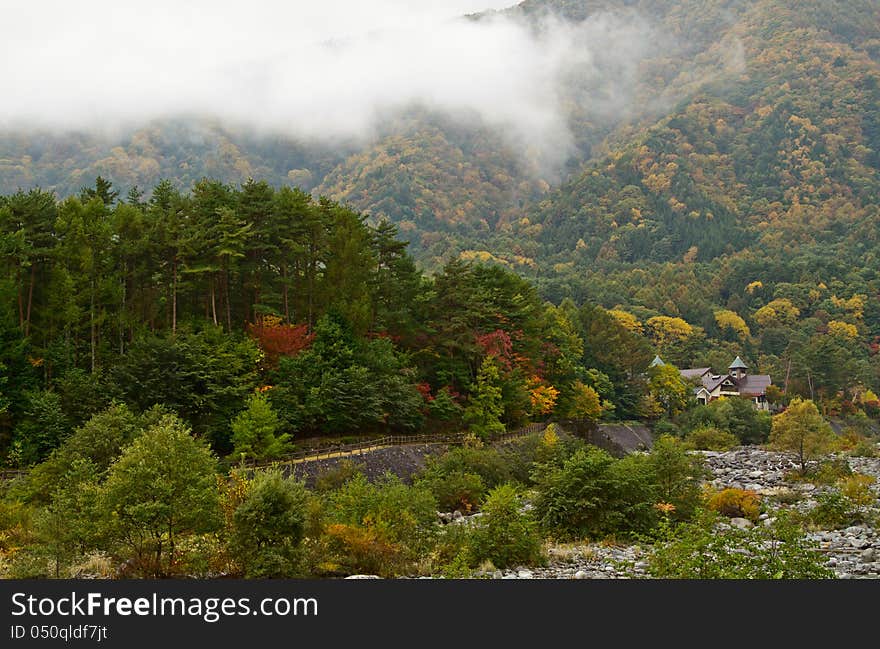 Mountain hotel in foggy weather. Mountain hotel in foggy weather.