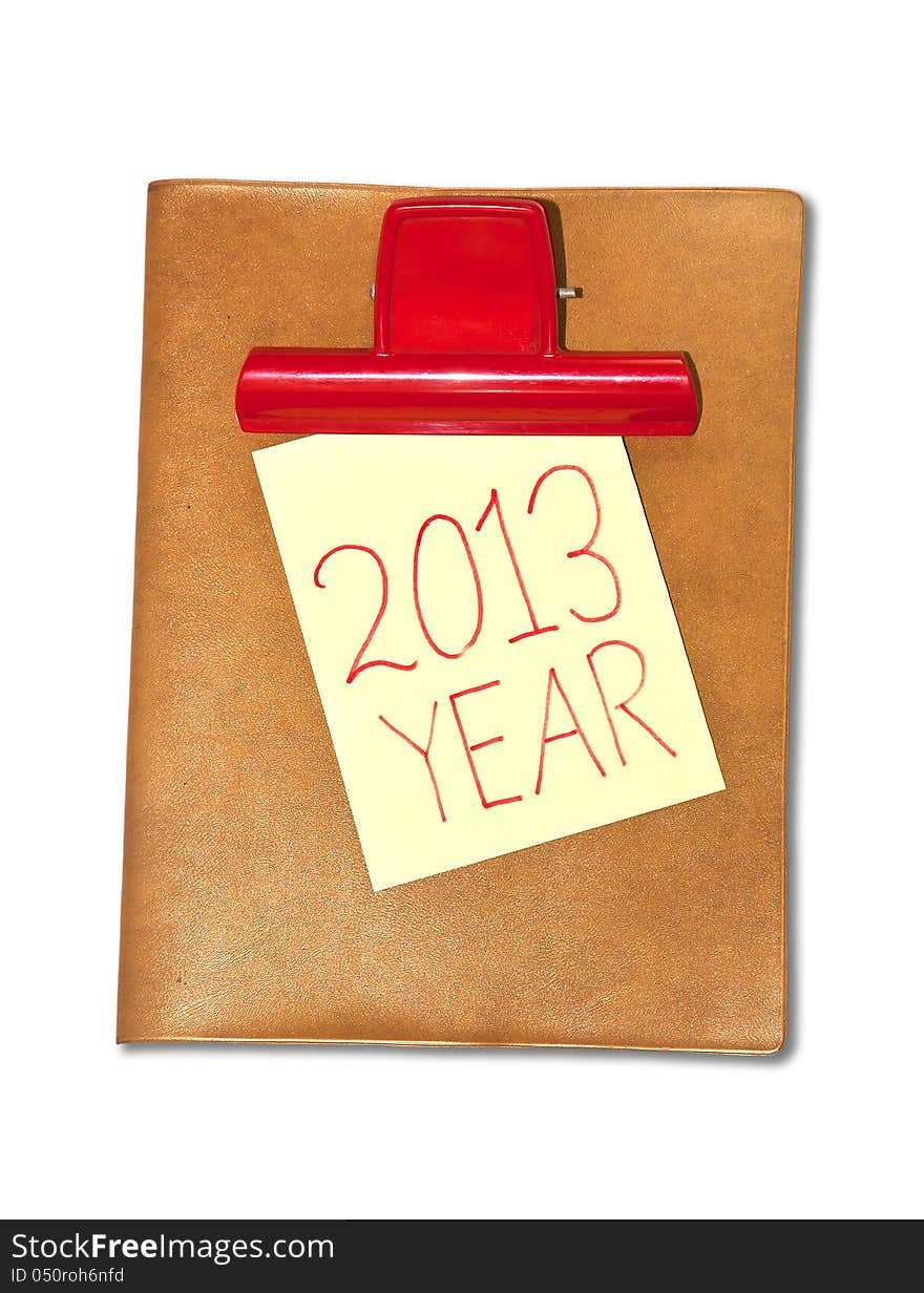 Message 2013 year in a note on the clip board. Message 2013 year in a note on the clip board.