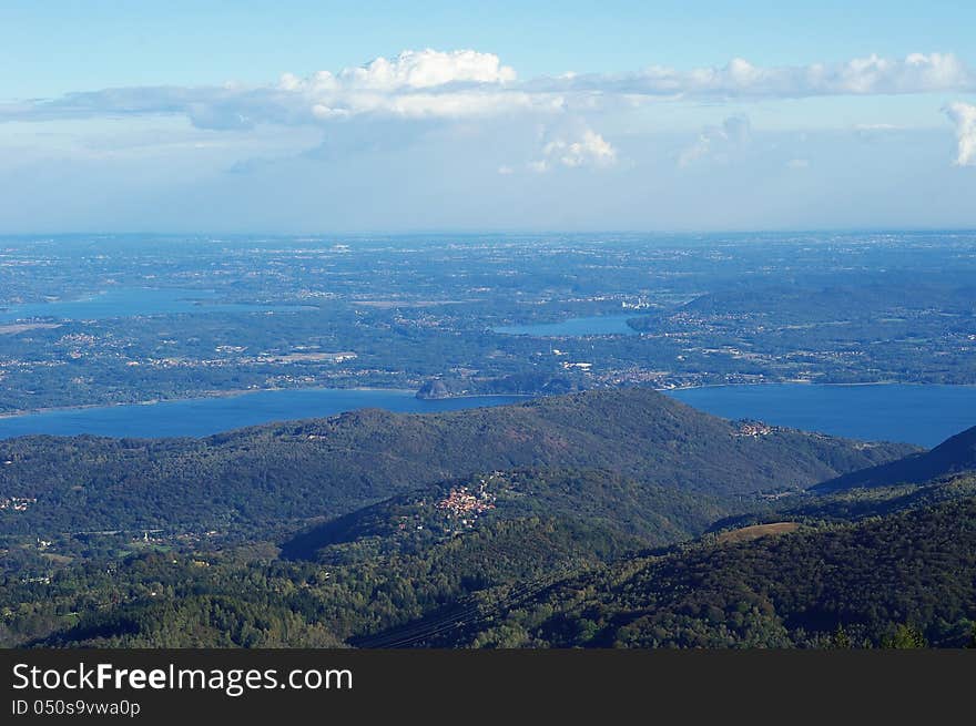 Panorama of Lakes and Northern Italy from mountain Mottarone, part of Alps