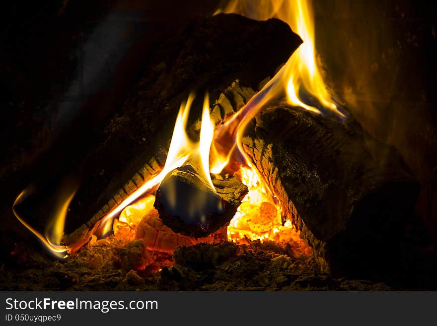 Fire and flames near the fireplace. Fire and flames near the fireplace.