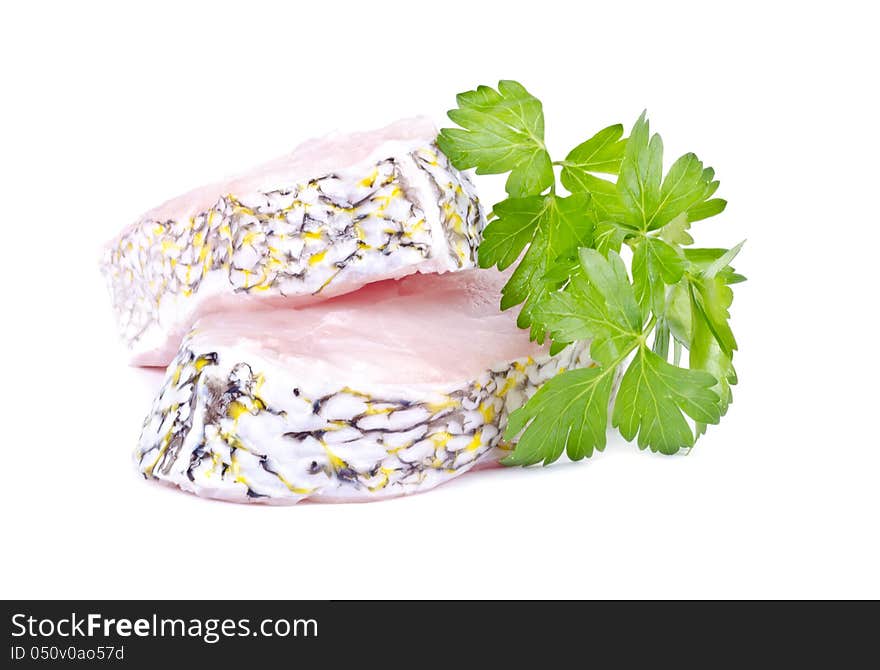 Two grouper steaks with parsley isolated on white. Two grouper steaks with parsley isolated on white.