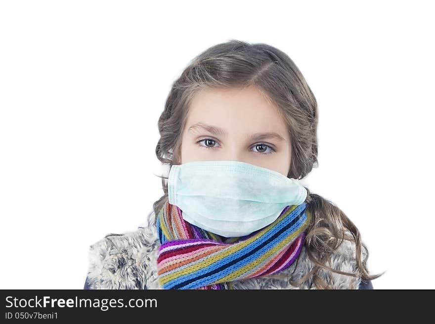 Portrait of young caucasian girl wearing facial mask and getting frozen. Portrait of young caucasian girl wearing facial mask and getting frozen