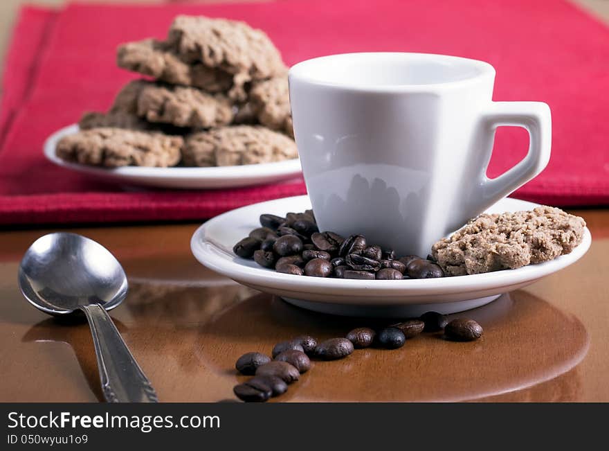 Coffee Cup and cakes on table. Coffee Cup and cakes on table