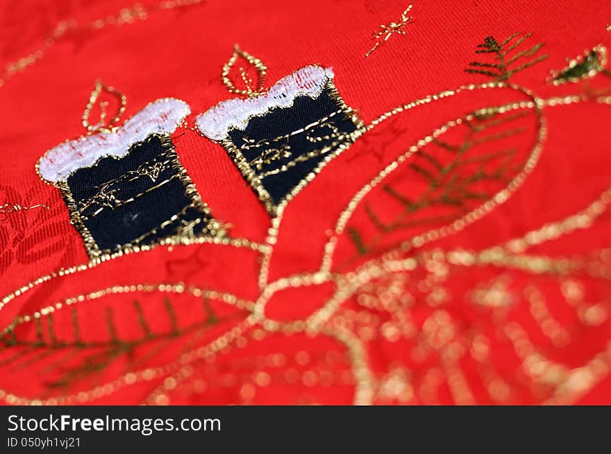 Red christmas table cloth with two candles. Red christmas table cloth with two candles