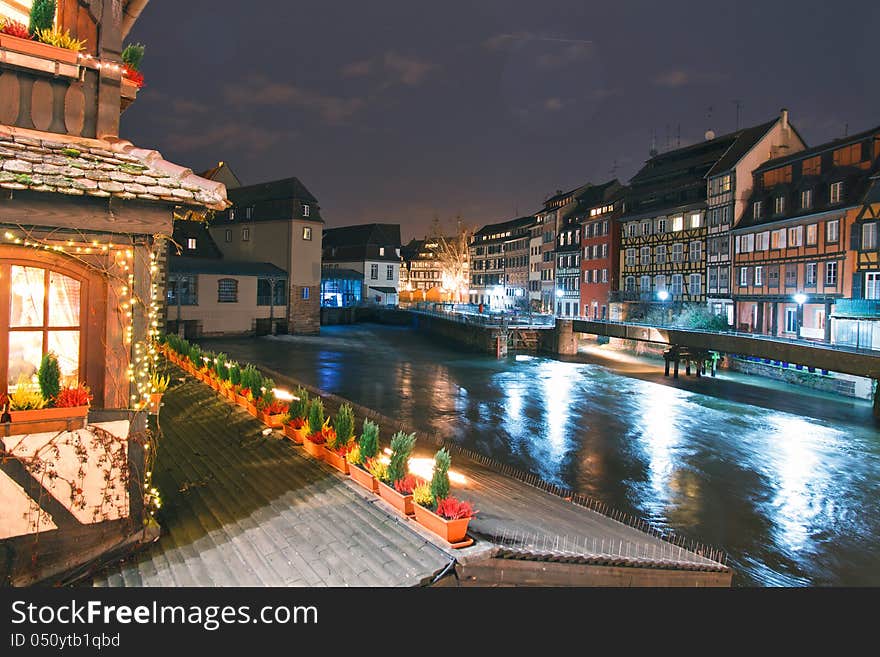 Balcony of Au Pont Saint Martin Restaurant at the Petite France along of the Ill river of Strasbourg, France. Balcony of Au Pont Saint Martin Restaurant at the Petite France along of the Ill river of Strasbourg, France