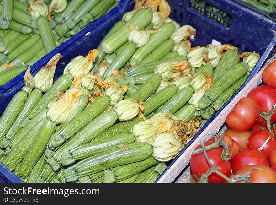 Some courgette with flowers at market. Some courgette with flowers at market