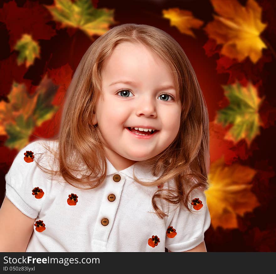 Girl on the abstract background with leaves