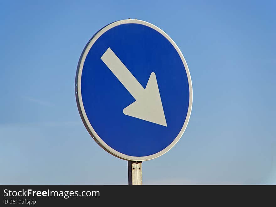 Mandatory road sign indicating pass on right. Mandatory road sign indicating pass on right