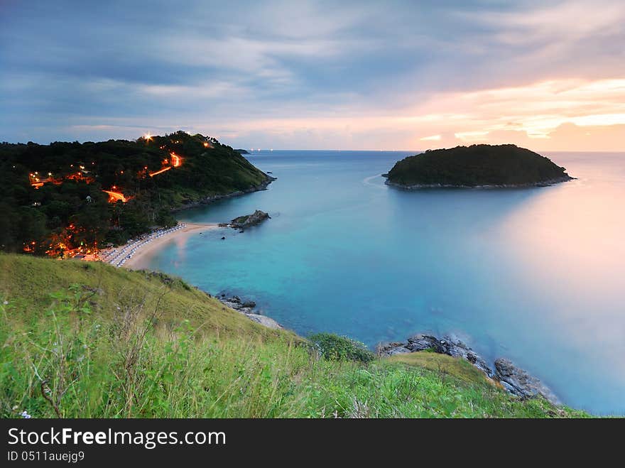 Cape is a mountain of rock that extends into the sea in Phuket, Thailand. Cape is a mountain of rock that extends into the sea in Phuket, Thailand