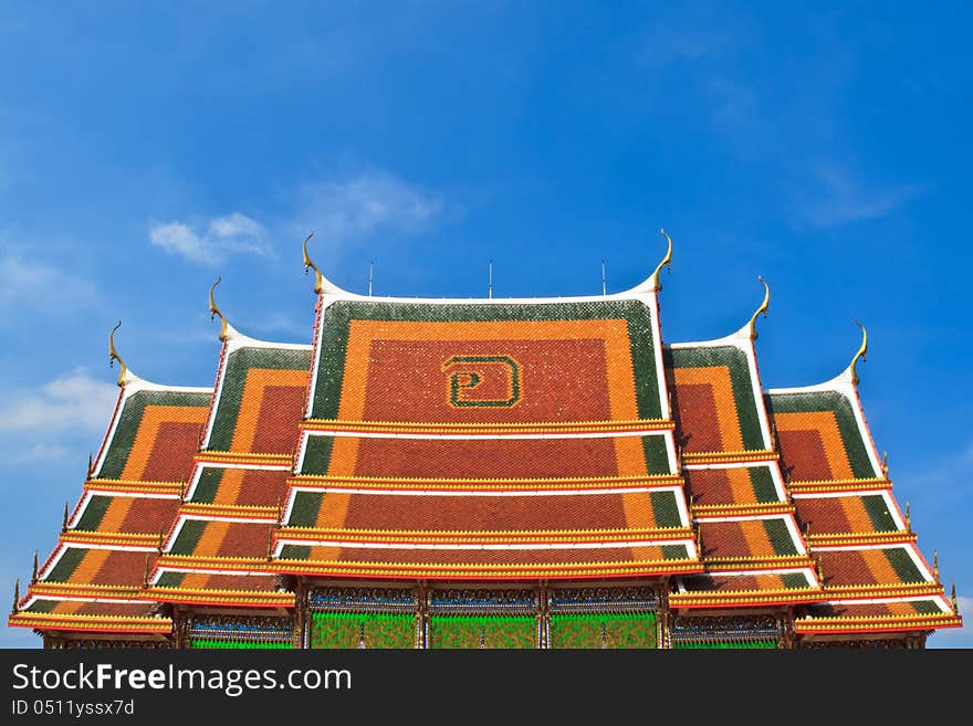 Thai temple roof with blue sky. Thai temple roof with blue sky