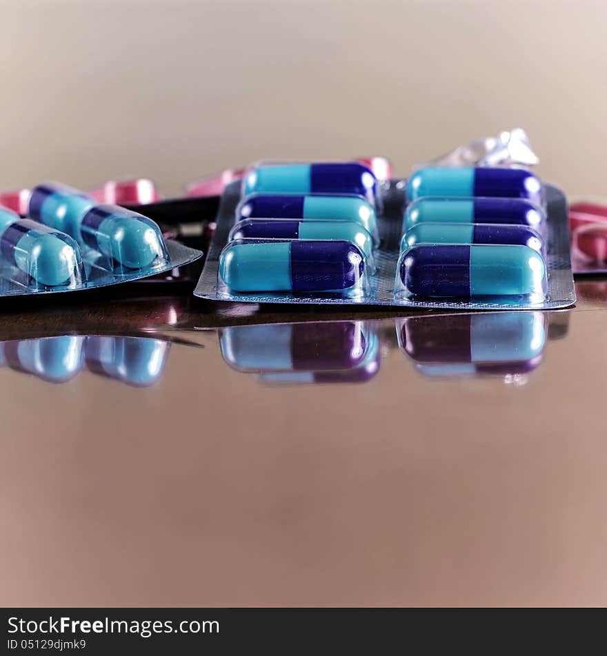 Tablets, pills, capsules on table. Tablets, pills, capsules on table