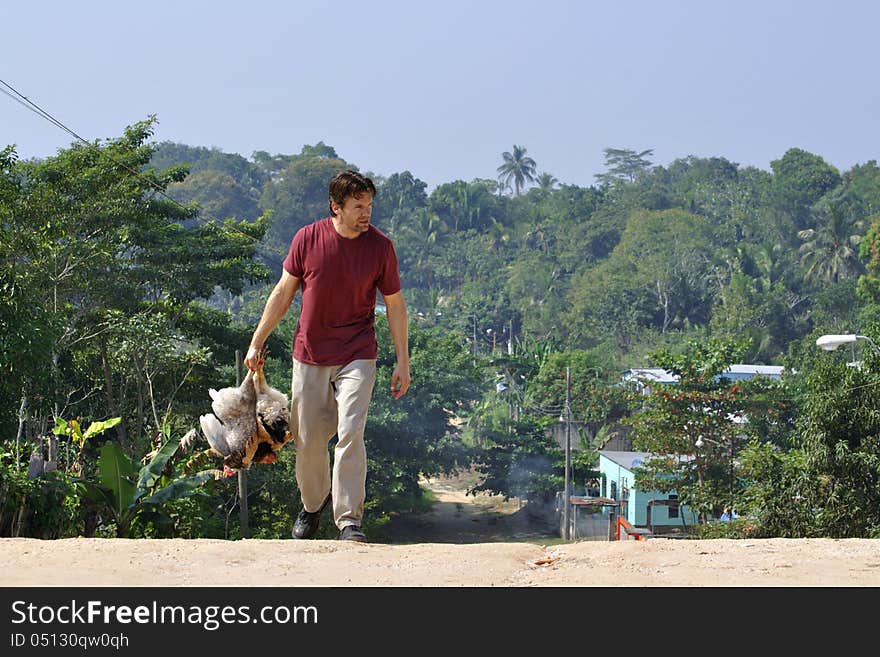 A Man And His Chickens