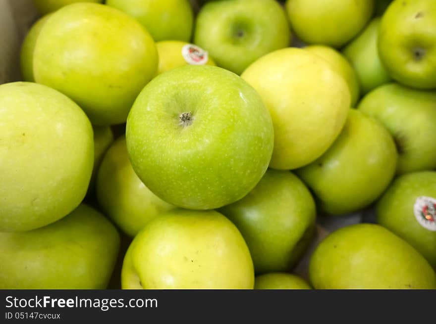 Close view of green apples at supermarket