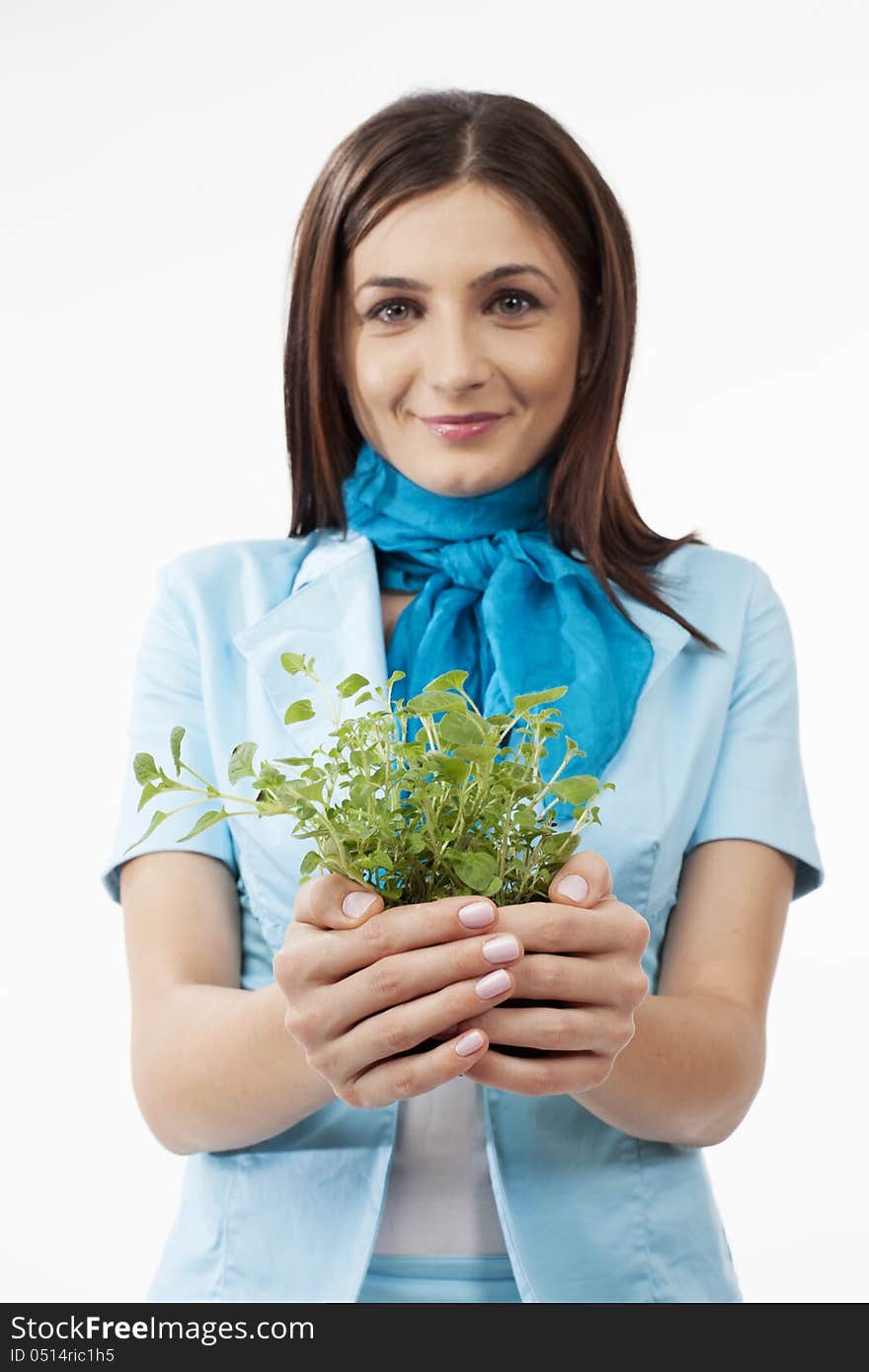 Woman presenting plants