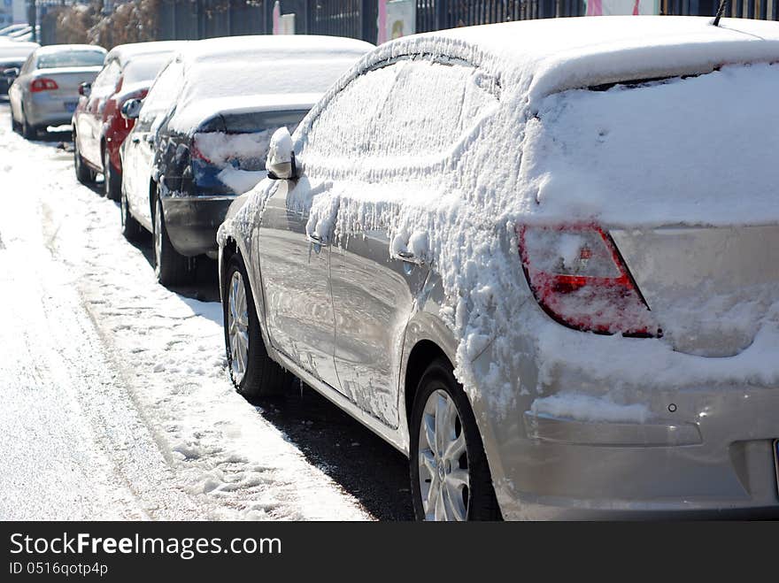 Snow covered car