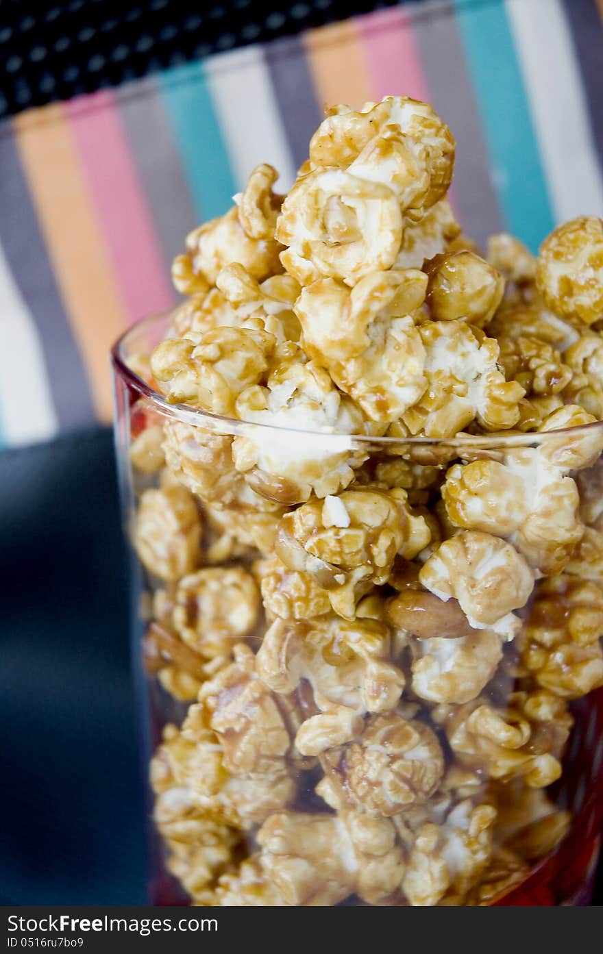 Clsoe up caramel popcorn in glass. Clsoe up caramel popcorn in glass