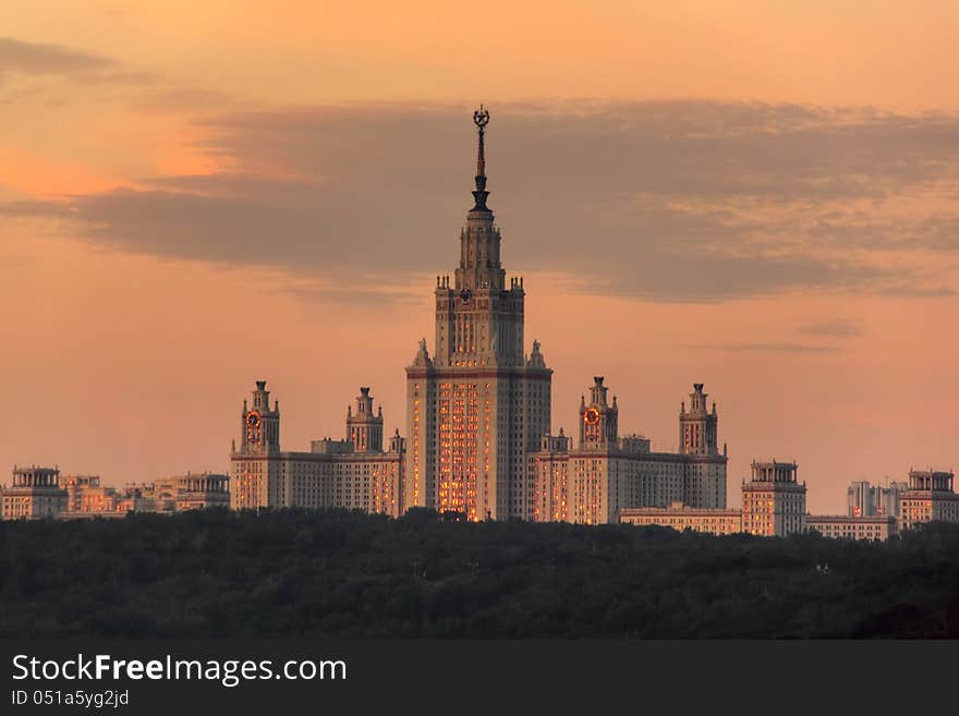 The building of the Moscow university against clouds. Summer evening. The building of the Moscow university against clouds. Summer evening.