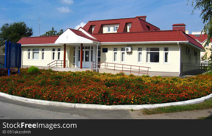 View On Establishment With Bed Of Flowers