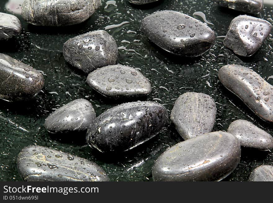 A background of black stones