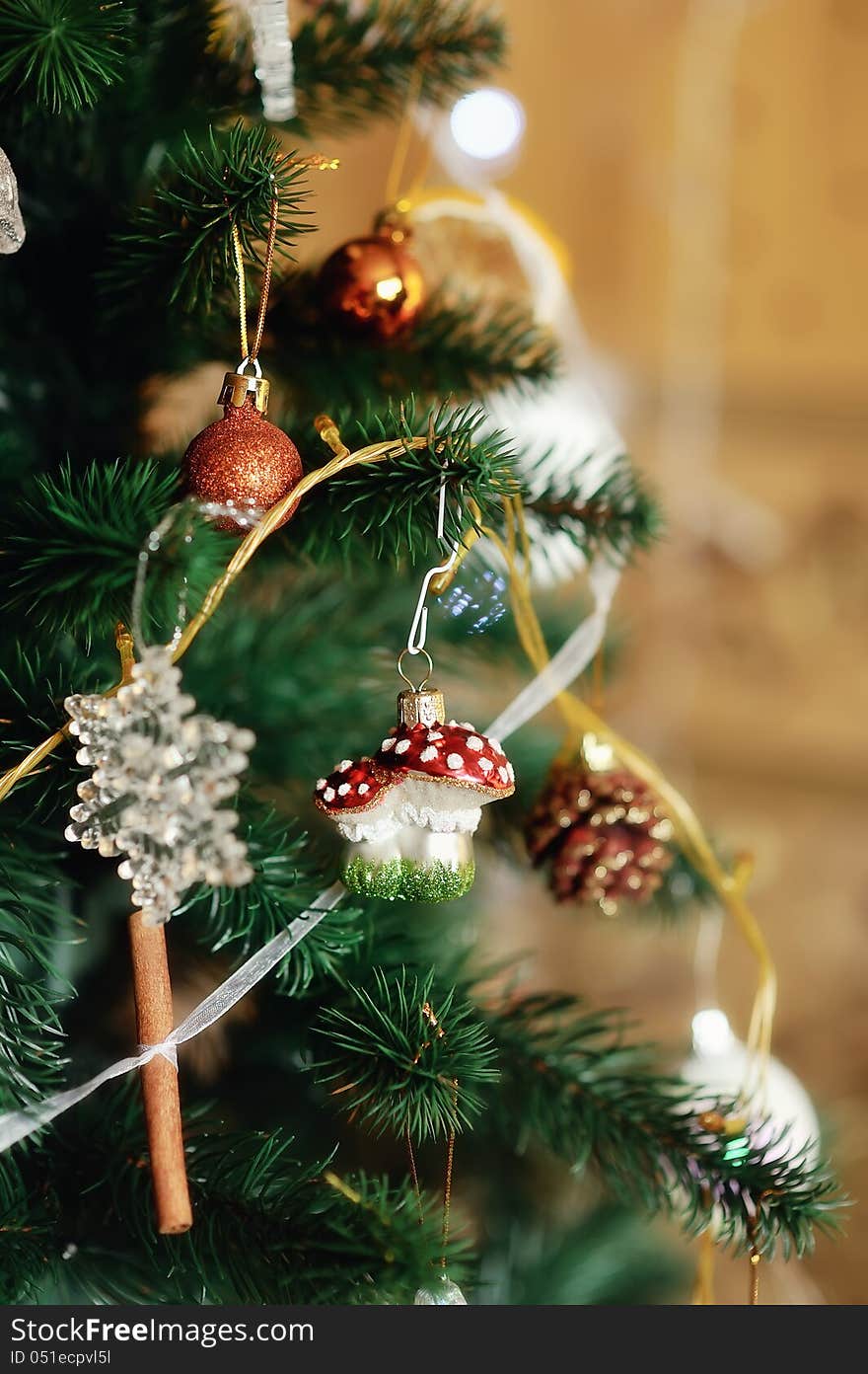 The New Year tree is decorated by toys the made hands. The New Year tree is decorated by toys the made hands