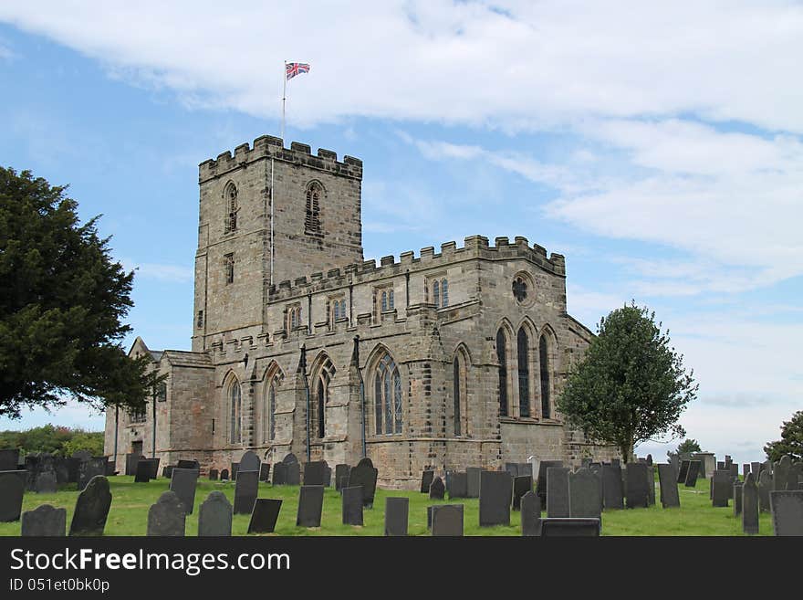 A Pretty Stone Built Church with a Tower.