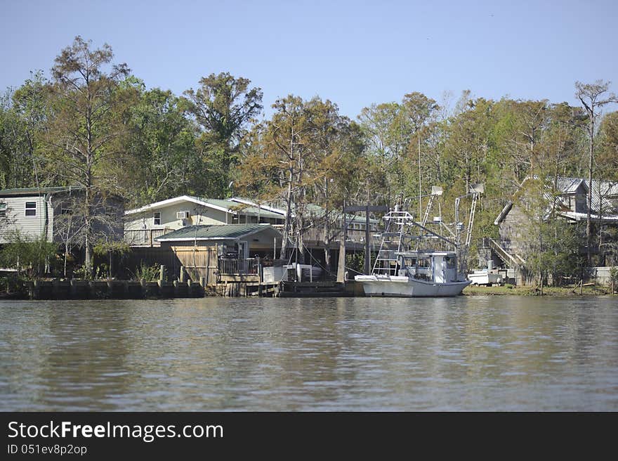 Many houses located by the river. Many houses located by the river