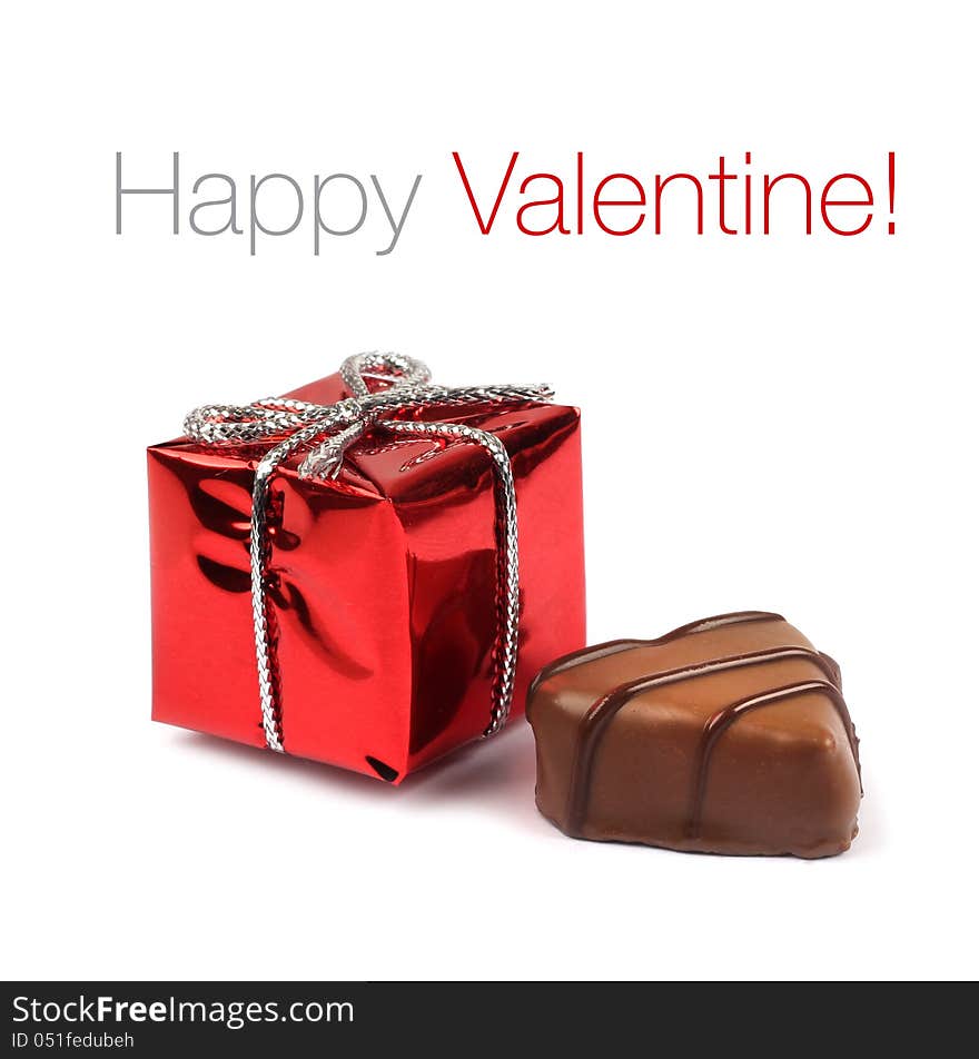 Small red Valentine present box with chocolate confection