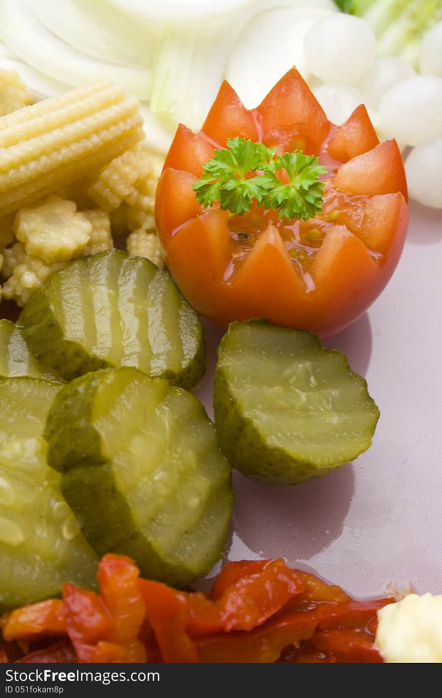 Vegetable garnish as an accompaniment to food served on a plate