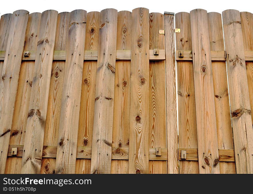 Wooden fence (pin) on white background