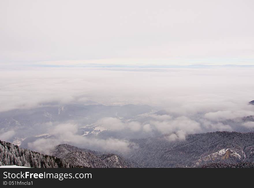 View over mountains with clouds