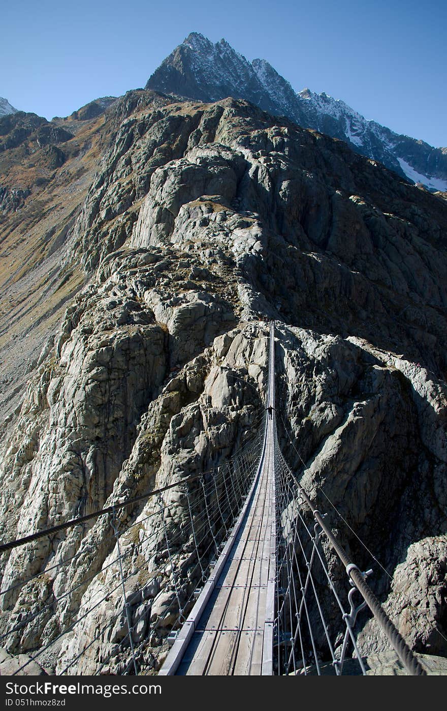 Trift suspension footbridge, Europe's highest situated rope suspension bridge, The Alps, Switzerland, Europe. Trift suspension footbridge, Europe's highest situated rope suspension bridge, The Alps, Switzerland, Europe