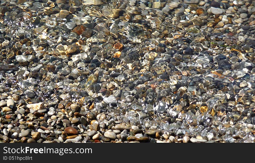 Stony beach in resort Tivat, Montenegro