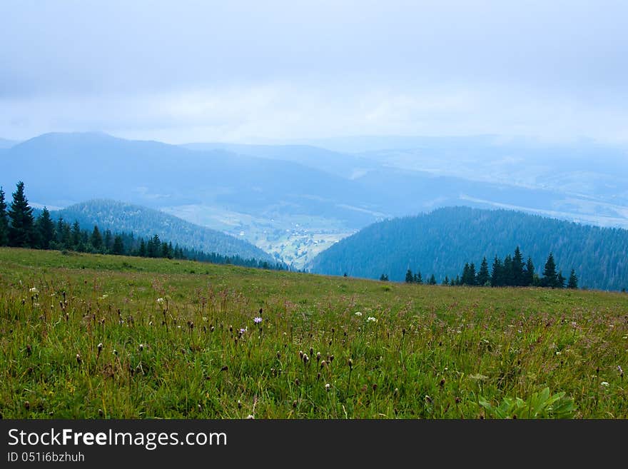 View of mountain peaks in spring time