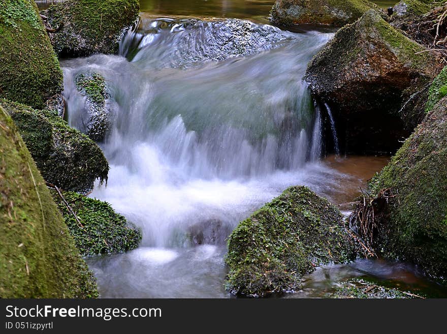 Waterfall on a mountain stream in the Harz National Park