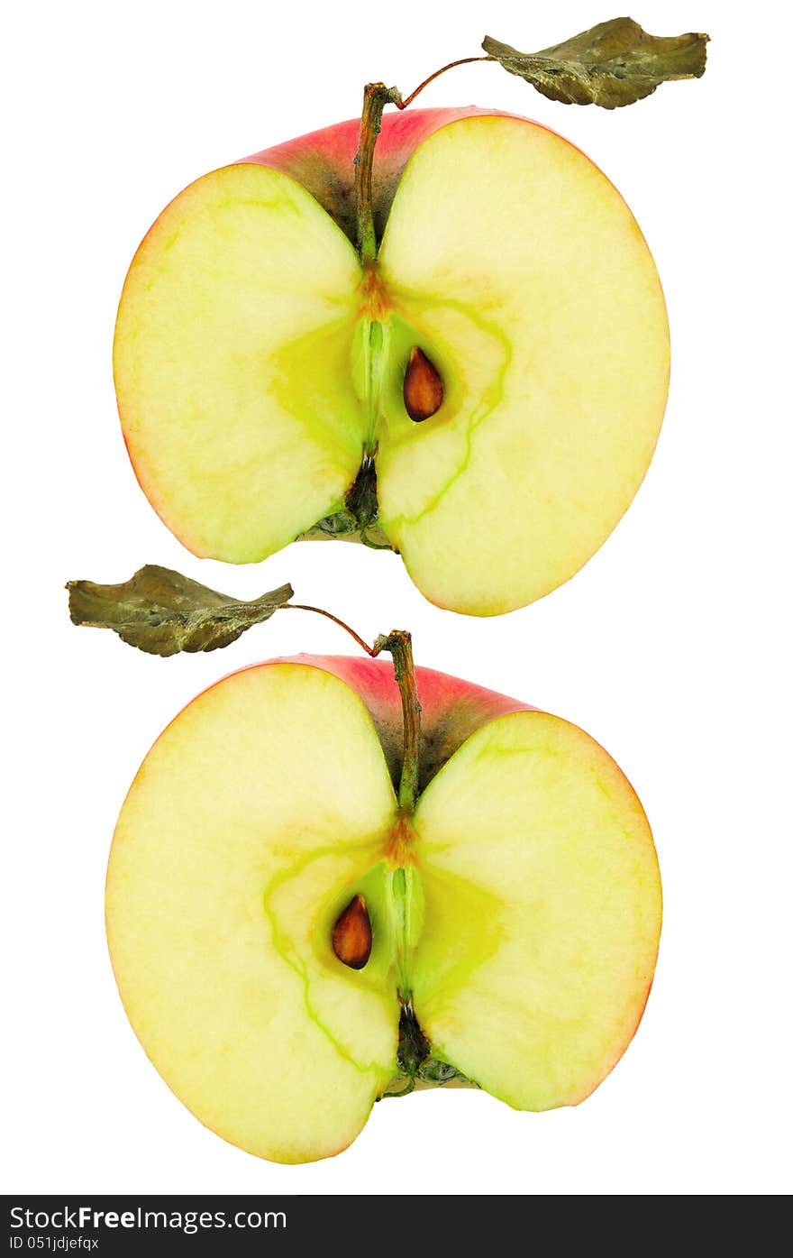 Collage of two halves of an apple with dry leaf isolated against a white background. Collage of two halves of an apple with dry leaf isolated against a white background