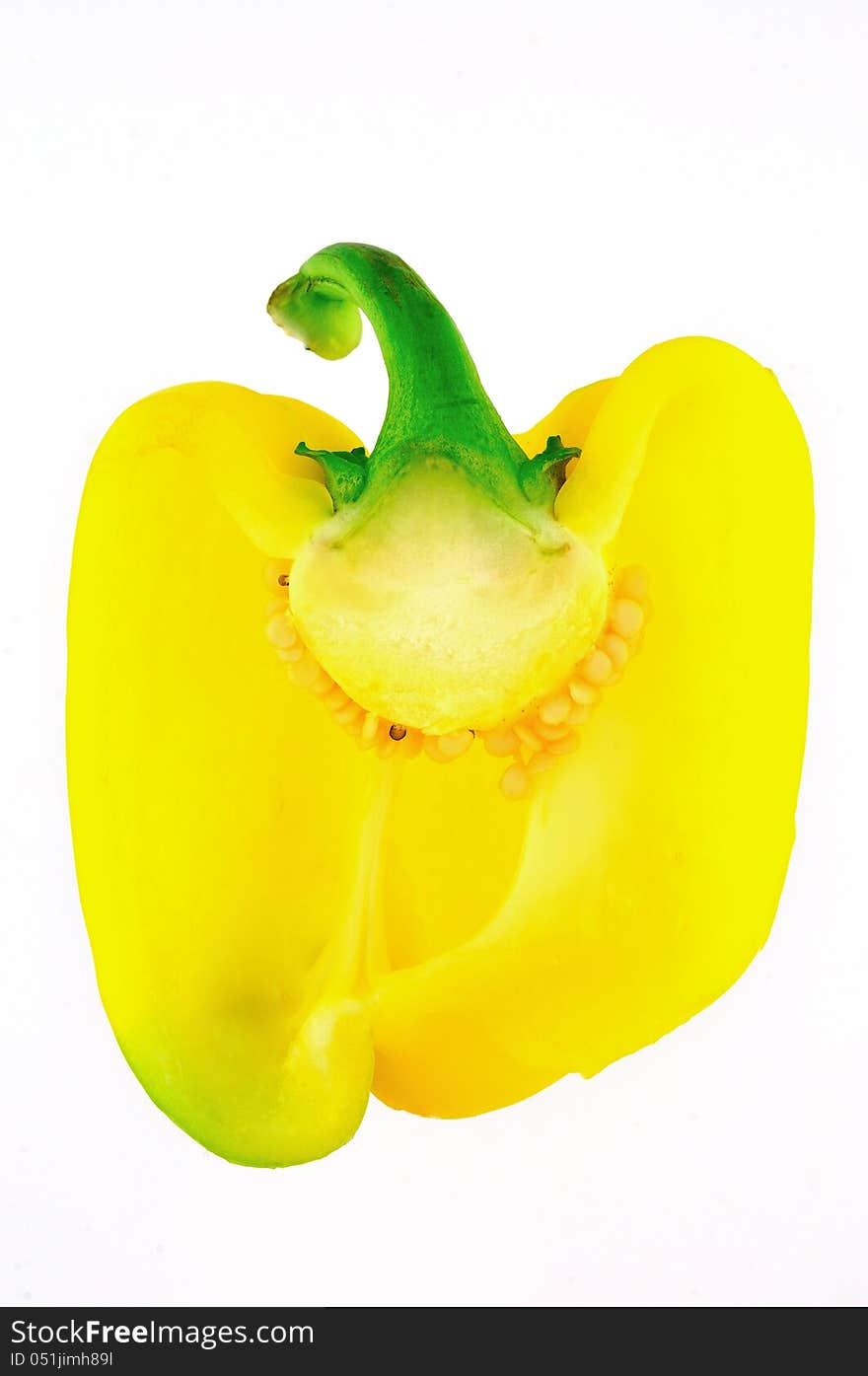 Half of Bulgarian yellow pepper photographed against a white background. Half of Bulgarian yellow pepper photographed against a white background