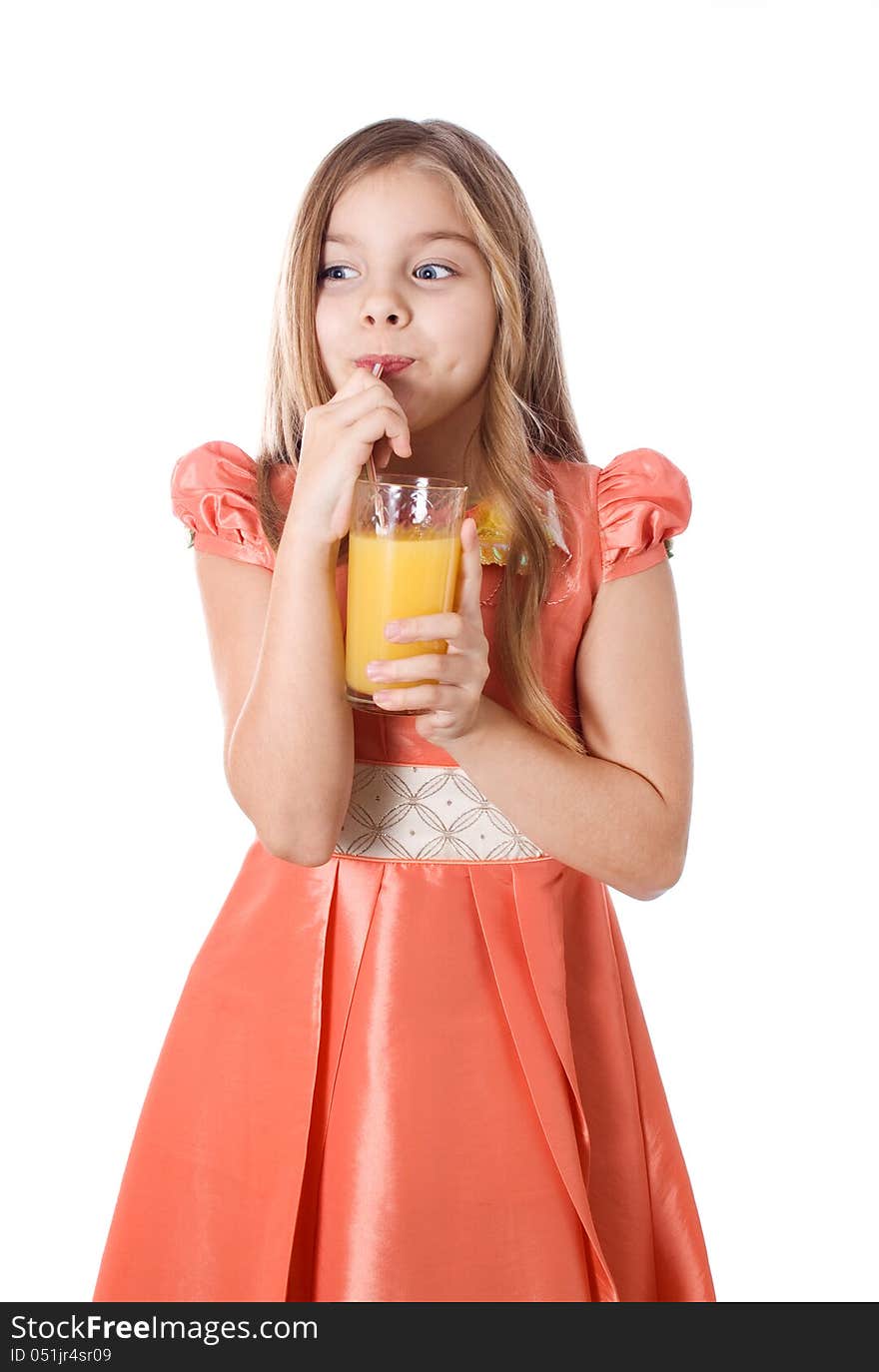 Portrait of happy little girl drinking orange juice. Portrait of happy little girl drinking orange juice