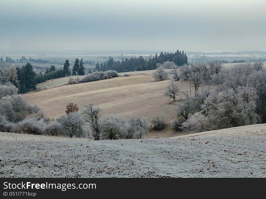 Overcast winter scenery with frozen landscape in winter. Overcast winter scenery with frozen landscape in winter