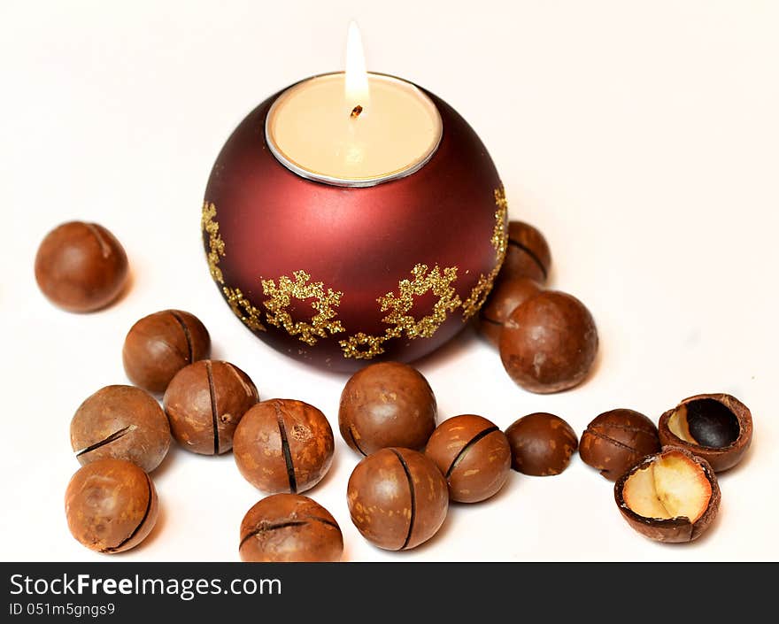 Candle and macadamia nuts