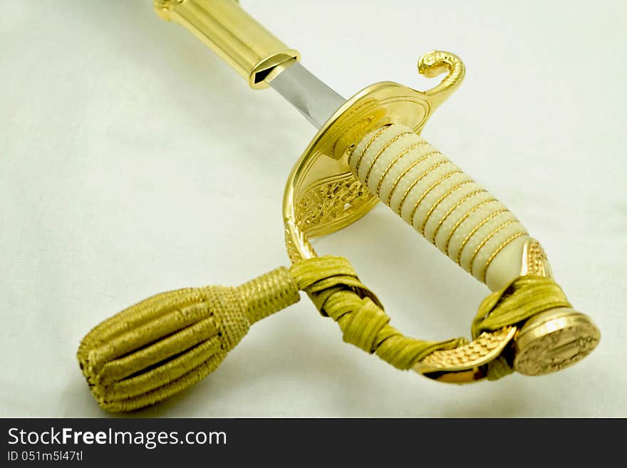 Navy officers sword hilt made of yellow metal. Navy officers sword hilt made of yellow metal