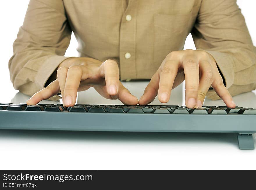 Woman hand typing on black computer keyboard over white background. Woman hand typing on black computer keyboard over white background