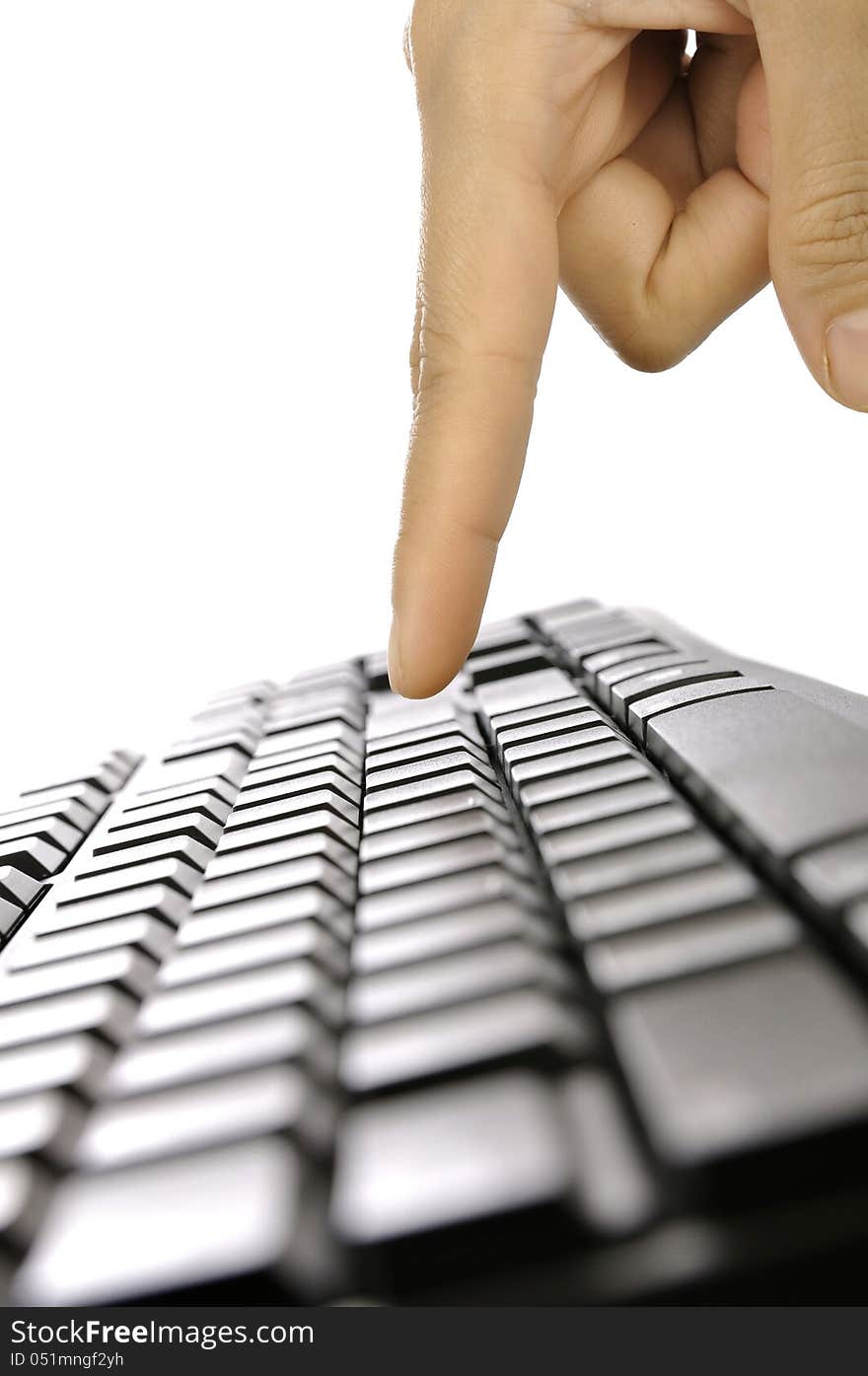 Woman hand typing on black computer keyboard isolated over white background. Woman hand typing on black computer keyboard isolated over white background