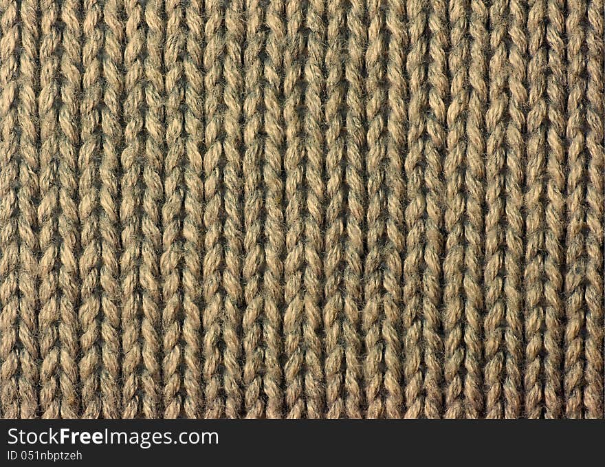 The structure of a knitted fabric closeup. The structure of a knitted fabric closeup