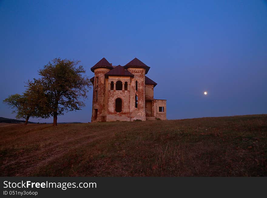 Mansion in midnight on hill