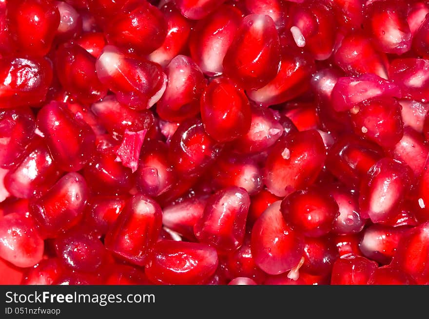 Pomegranate seeds background - macro view