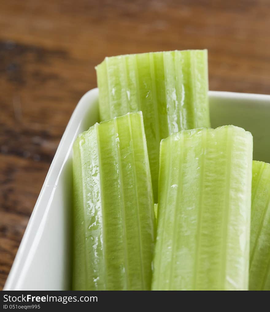 Celery Stalks in a White Bowl